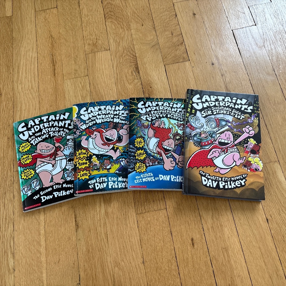 Lot of 4 Pre-Owned Captain Underpants Books 1 Hardcover and 3 Softcover